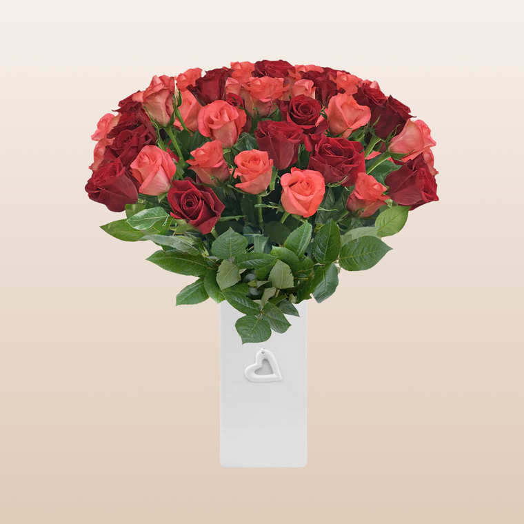 Red and Coral roses the best flower arrangement centerpieces bouquets to order online for any ocassion weddings, or event planners and valentine's day