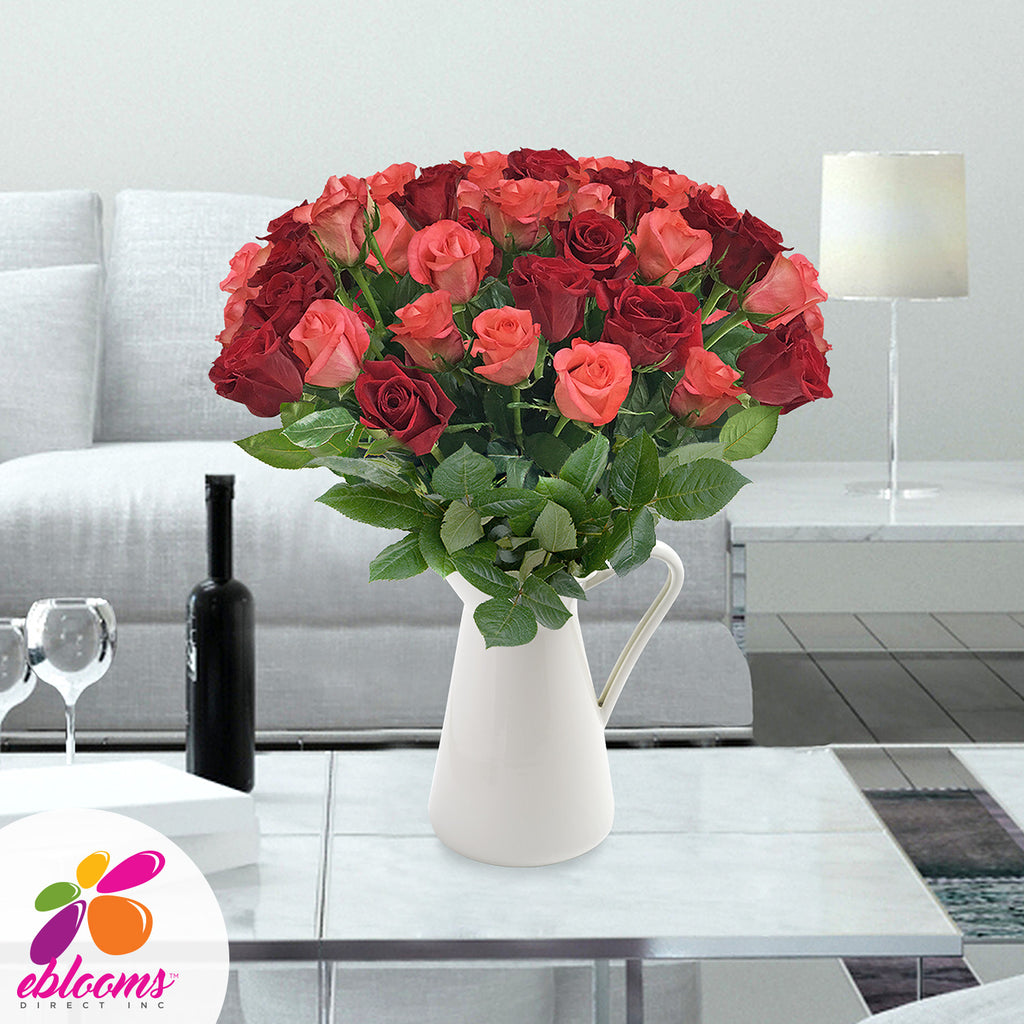 Red and Coral roses the best flower arrangement centerpieces bouquets to order online for any ocassion weddings, or event planners and valentine's day