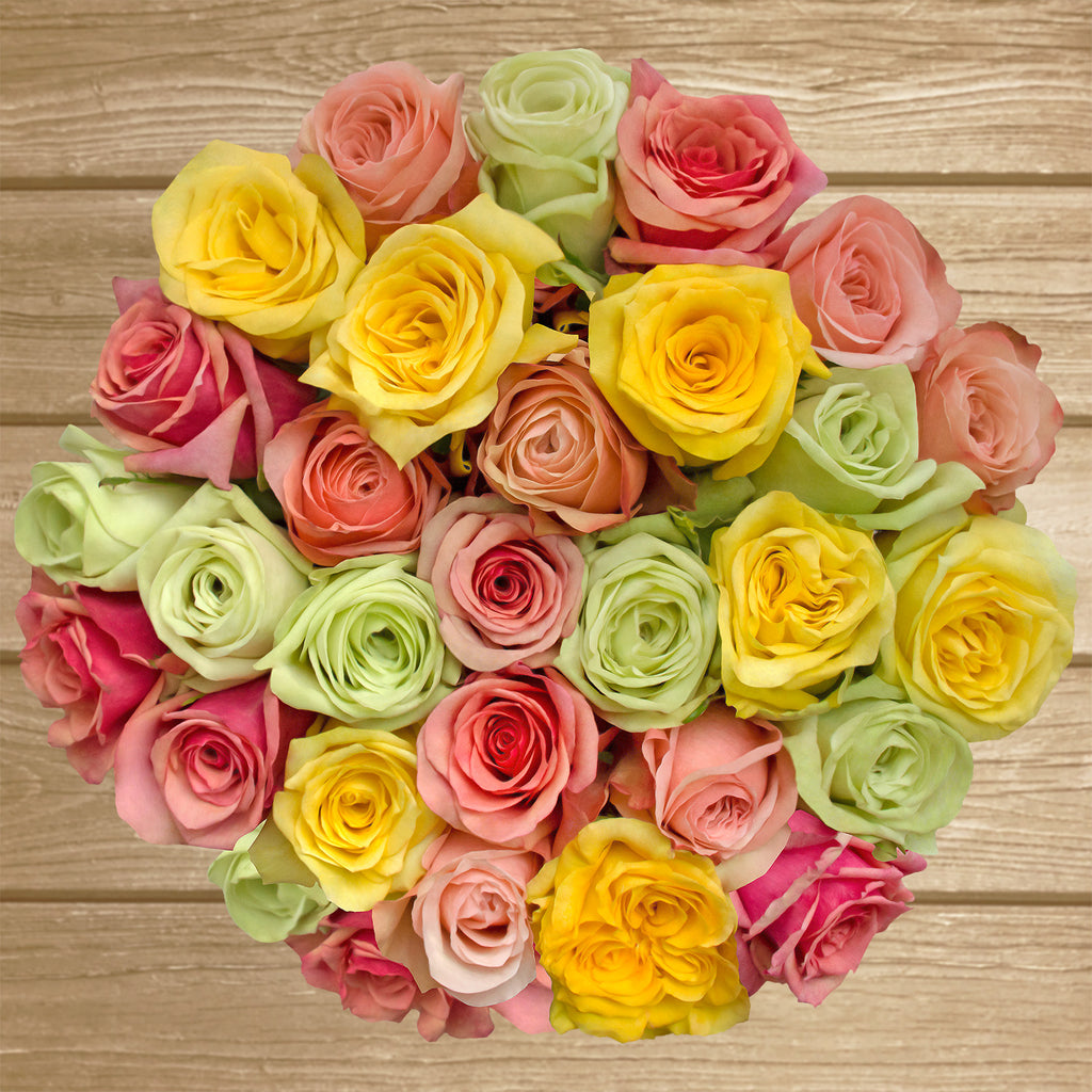 Rainbow pastel roses the best flower arrangement centerpieces bouquets to order online for any ocassion weddings, or event planners and valentine's day