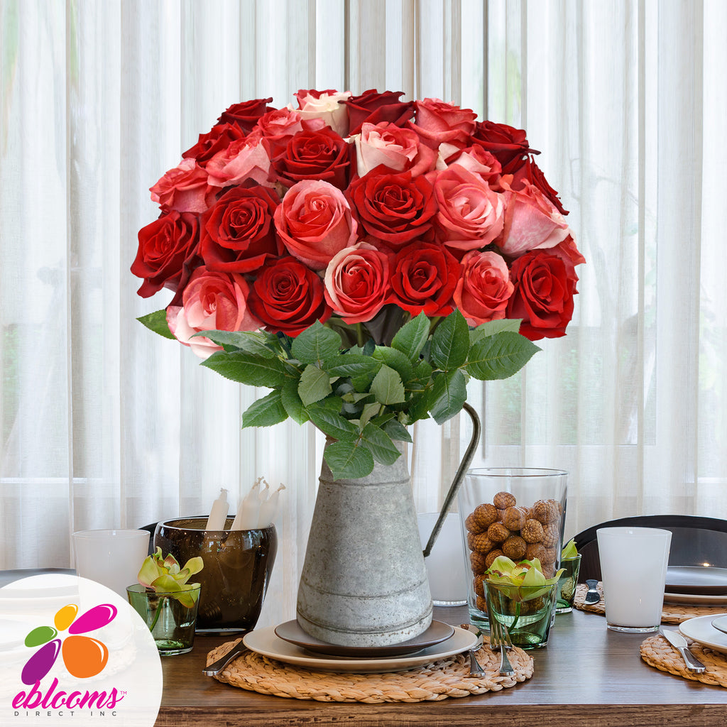 Red and tinted white red roses the best flower arrangement centerpieces bouquets to order online for any ocassion weddings, or event planners and valentine's day