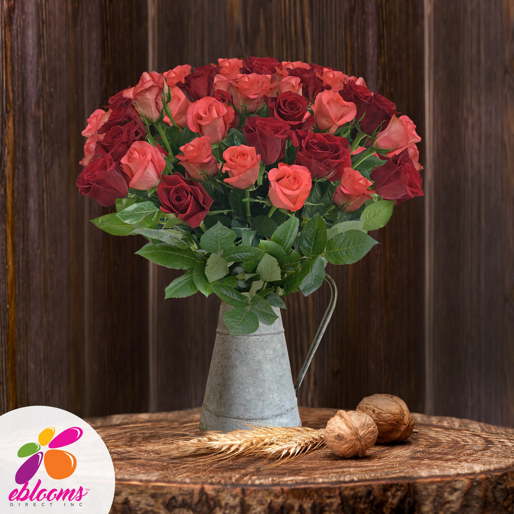 Red and Coral roses the best flower arrangement centerpieces bouquets to order online for any ocassion weddings, or event planners