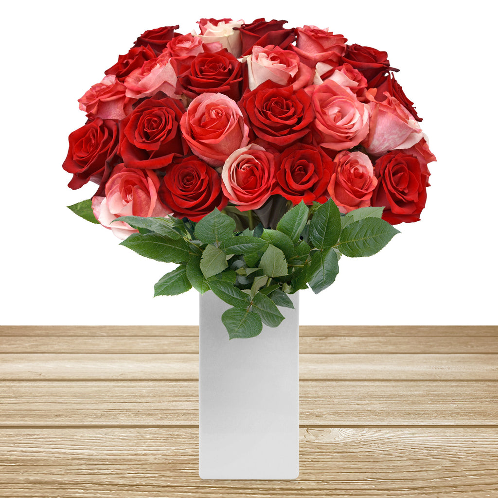 Red and tinted white red roses the best flower arrangement centerpieces bouquets to order online for any ocassion weddings, or event planners and valentine's day