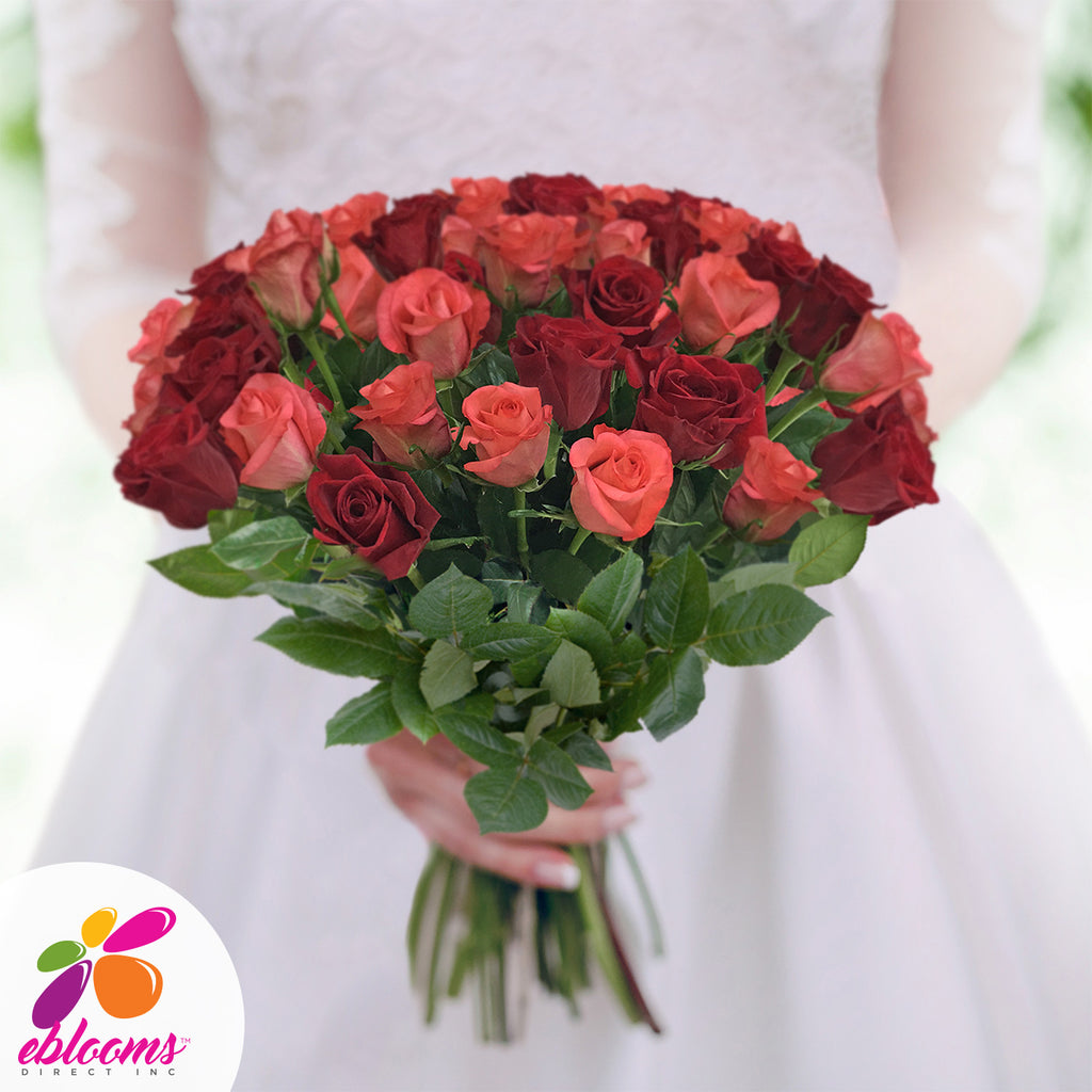 Red and Coral roses the best flower arrangement centerpieces bouquets to order online for any ocassion weddings, or event planners and valentine's day
