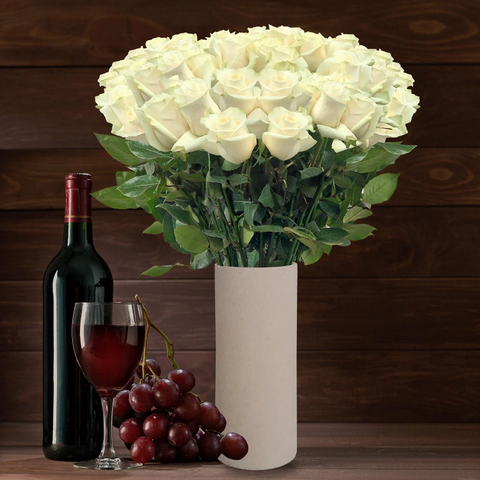 White roses the best flower arrangement centerpieces bouquets to order online for any ocassion weddings, or event planners  and Valentine's day